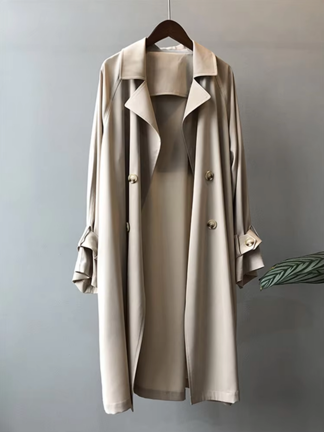 Elegant women's waterproof long trench coat, double-breasted design, ideal outerwear for fall & spring fashion.
