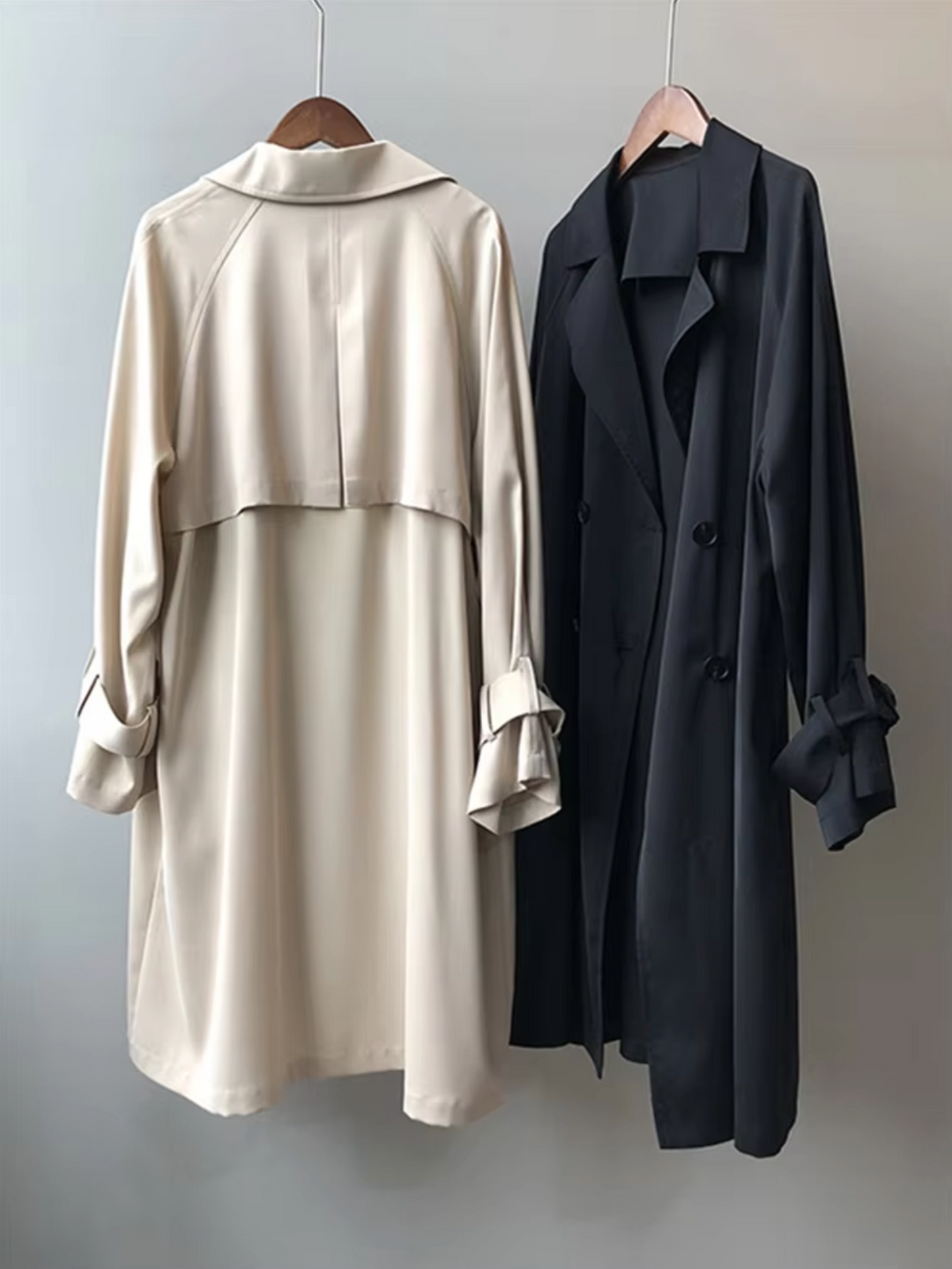 Stylish women's long waterproof trench coat, double-breasted and tailored for a chic, elegant fall fashion look.