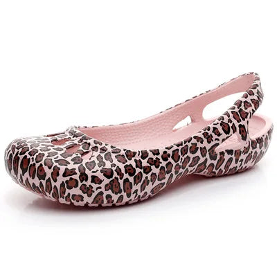 Chic women's flat slingback jelly sandals, ultimate waterproof comfort for summer outings.