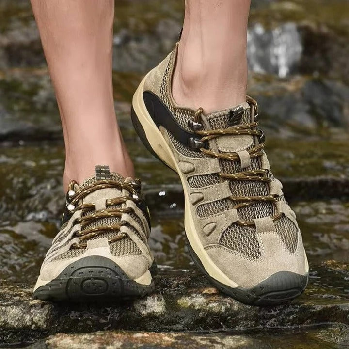 Women's waterproof hiking shoes for all-terrain outdoor adventure. Durable trail footwear with traction grip.