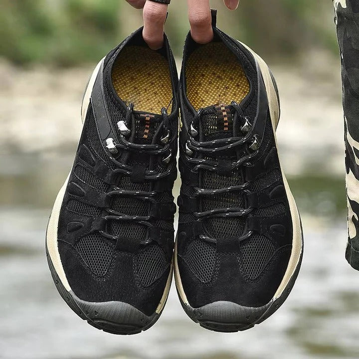 Conquer outdoor trails with women's waterproof hiking shoes, all-terrain traction & ankle support.