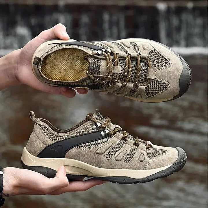 Women's durable waterproof hiking shoes, ideal for wet weather outdoor adventure & challenging trails.