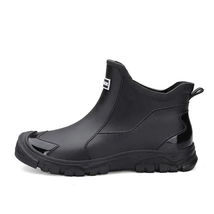 Comfortable women's waterproof Chelsea rain boots, stylish slip-on ankle design for durable wet weather protection.