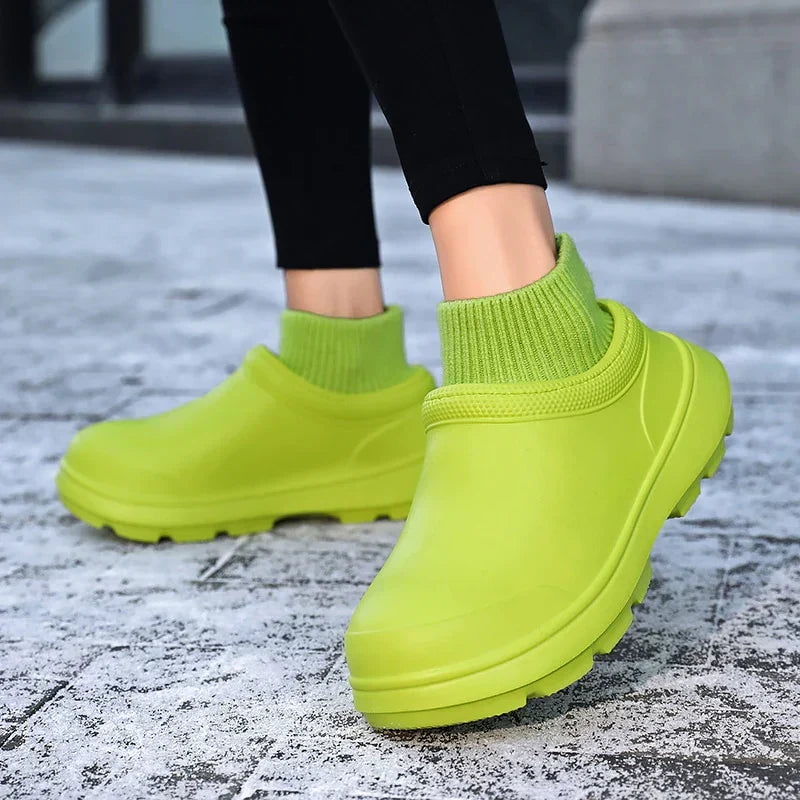 Side view: Madeline women's waterproof slip-on clogs, highlighting the cozy knitted ankle cuff & non-slip sole.