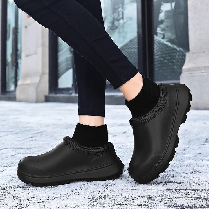 Madeline women's waterproof slip-on clogs with cozy ankle cuff, closed toe, & non-slip sole for all-day comfort.