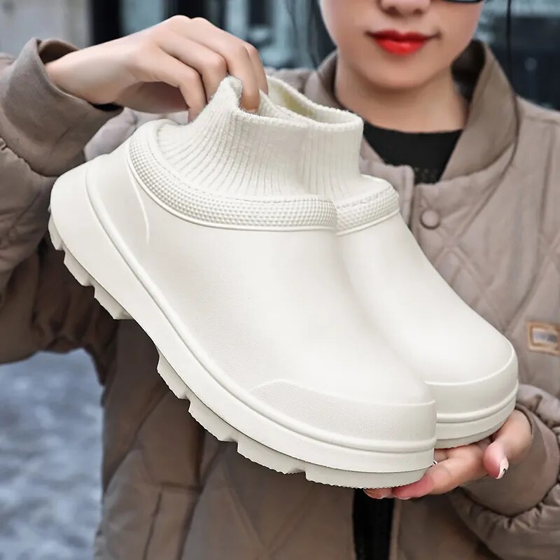 Women's waterproof slip-on clogs with soft knitted ankle cuff & sturdy non-slip sole for comfortable daily wear.