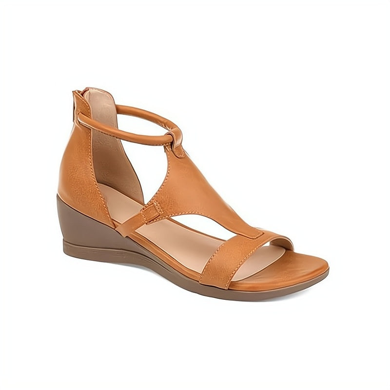 Women's open-toe wedge heel sandals with an ankle strap for elegant summer footwear.