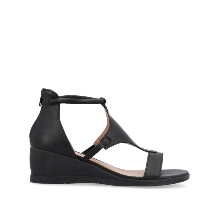 Elegant women's wedge heel sandals featuring an open toe and secure ankle strap.
