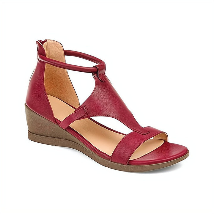 Comfortable summer women's open-toe wedge sandals with a stylish ankle strap design.