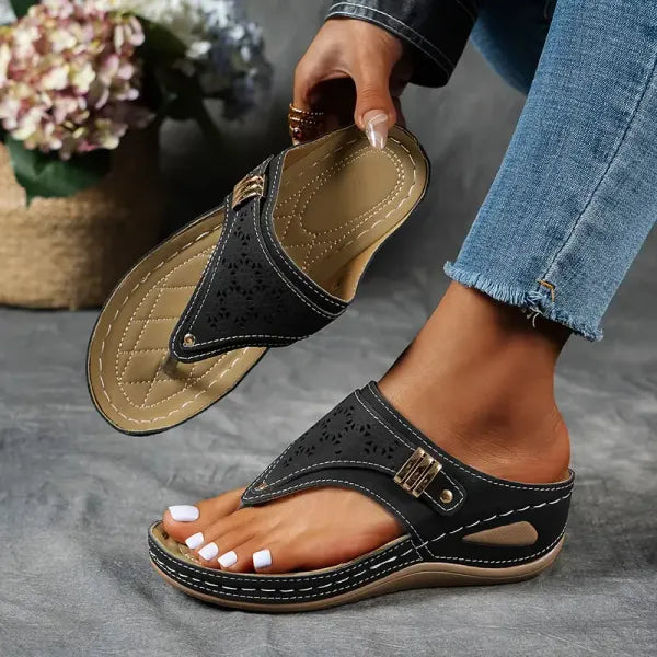 Women's wedge sandals with adjustable straps for all-day comfort. Perfect open-toe summer footwear.