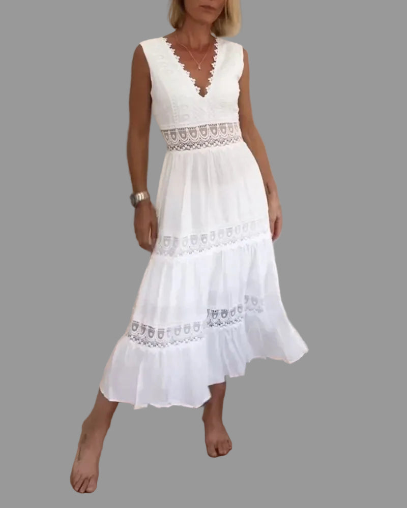 Women's white boho chic flowing midi dress, perfect for summer vacations, festivals, or stylish casual wear.
