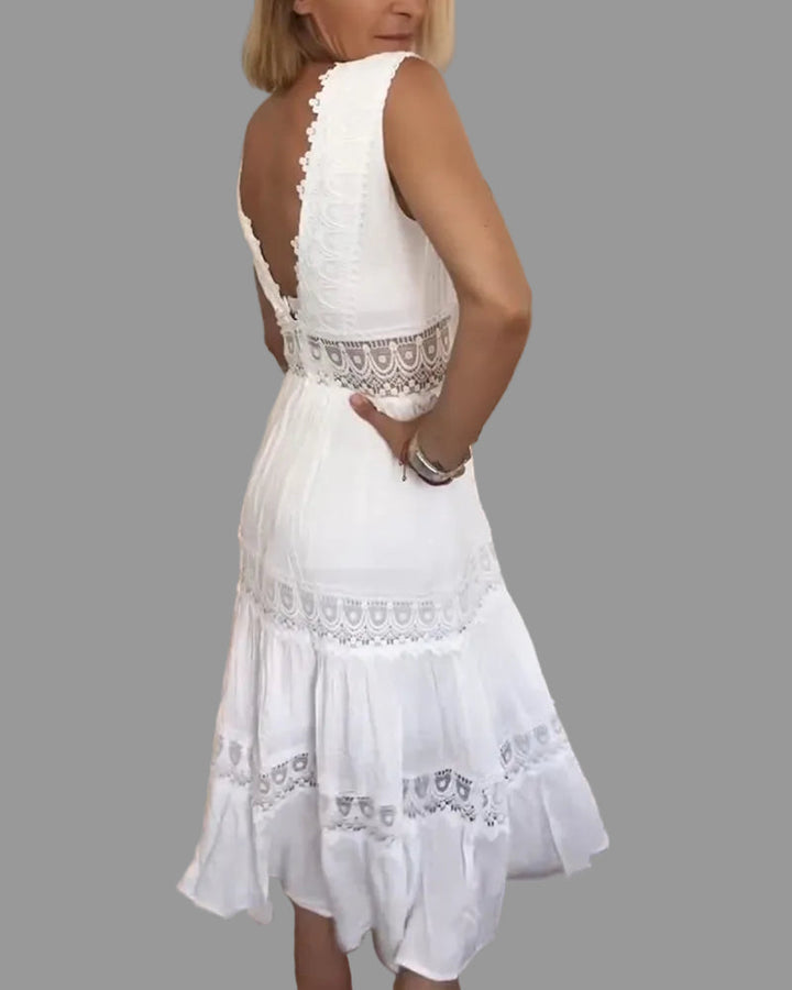 Effortless women's bohemian white midi dress with a flowing design, ideal for summer, beach, or casual chic.