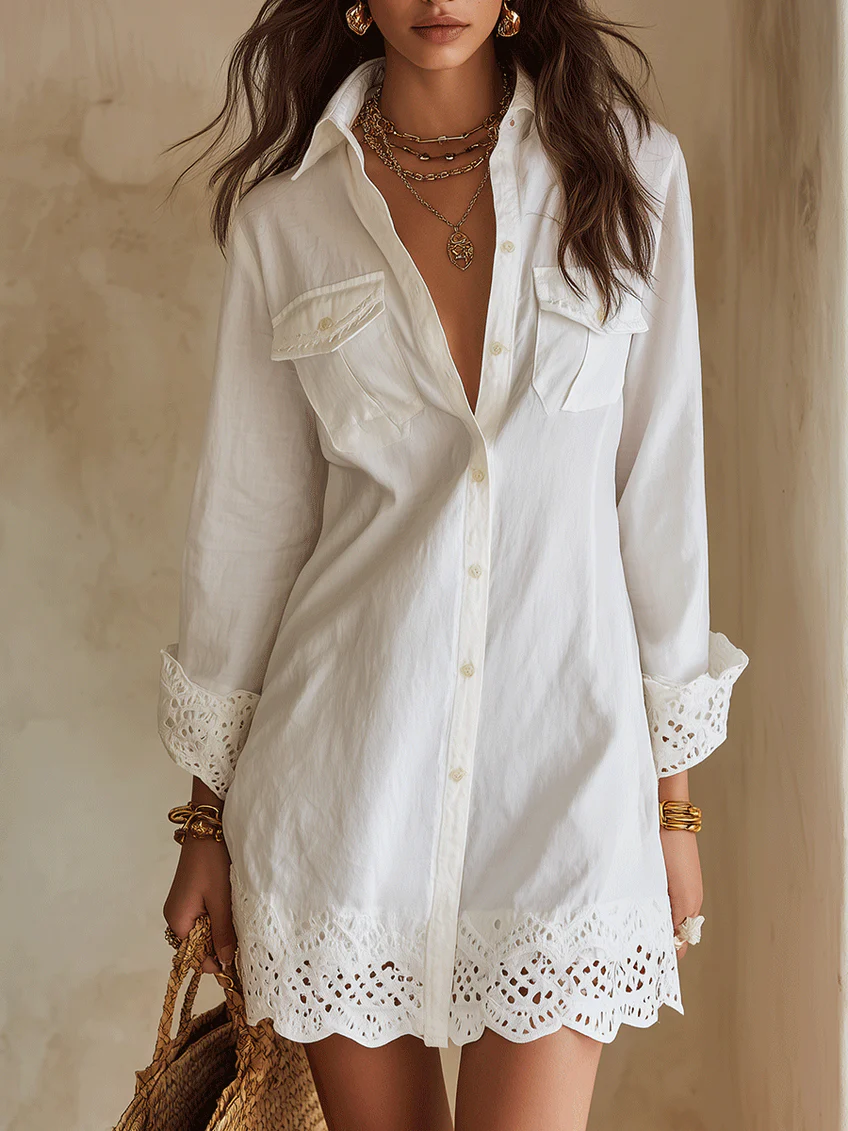 Women's white button-front mini shirt dress with long sleeves & delicate crochet hem, perfect for casual summer wear.