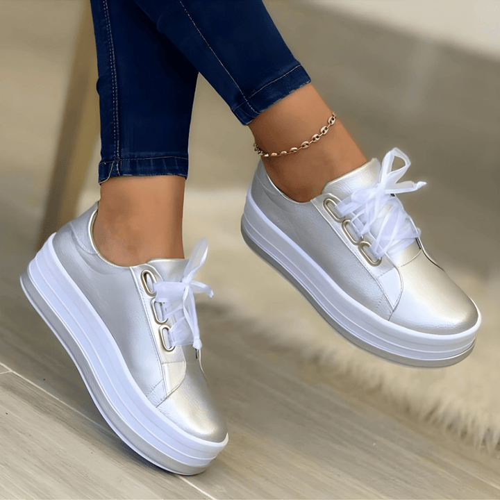Stylish women's platform sneakers with a thick, elevated sole for a trendy and comfortable look