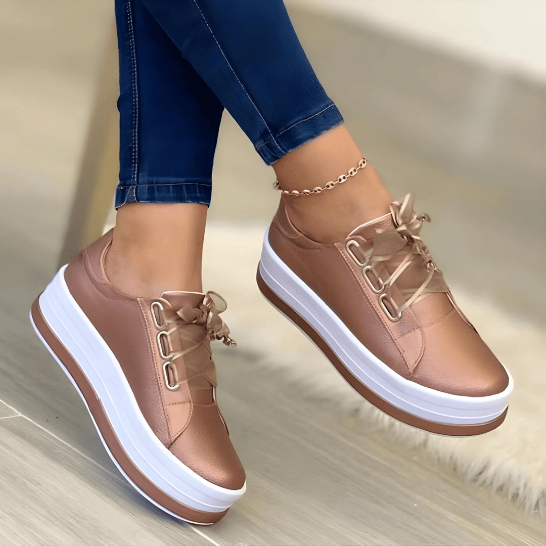Casual women's fashion sneakers featuring an elevated platform sole, ideal for everyday style