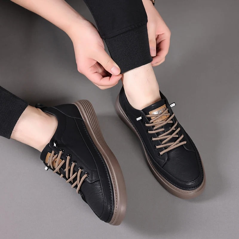 Stylish women's leather sneakers in black, perfect for casual wear and daily walks