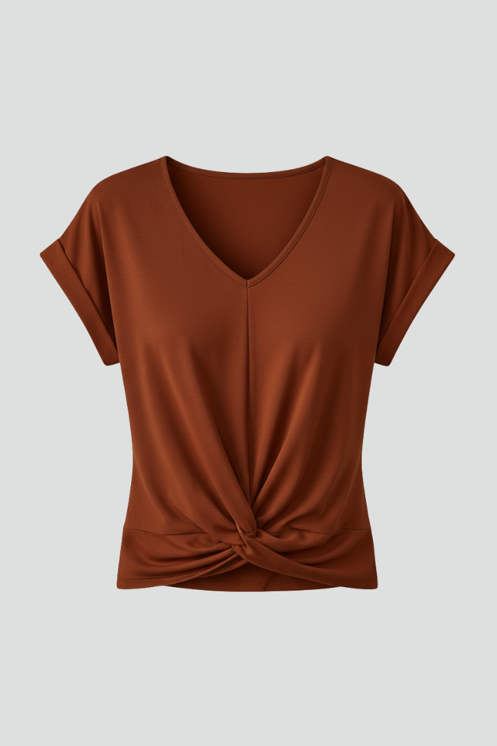 Women's white loose fit V-neck t-shirt. Effortless style & comfort for everyday wear.