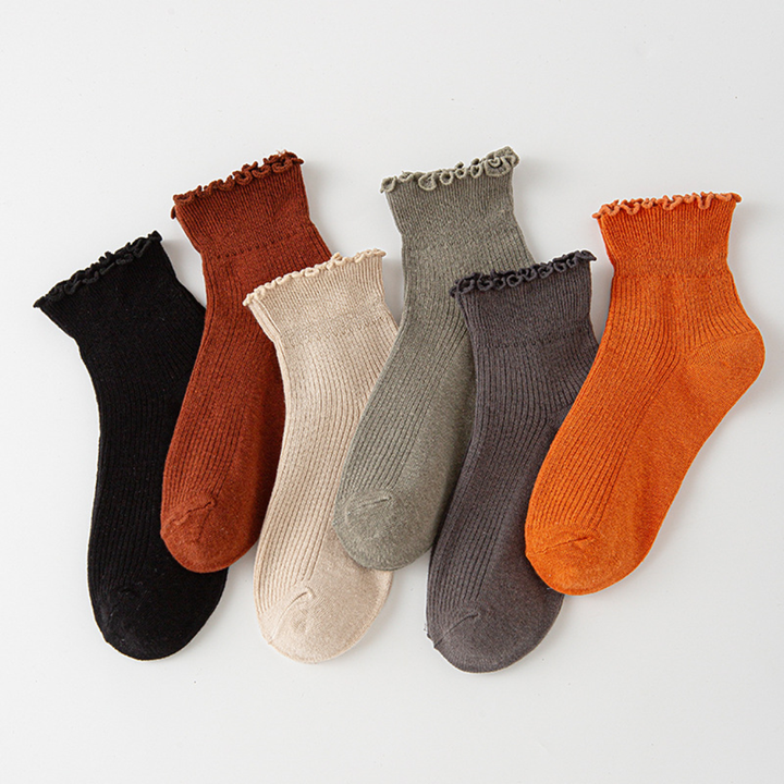 Stylish women's ruffle ankle socks, a playful fashion accessory for casual outfits or dressy shoes.