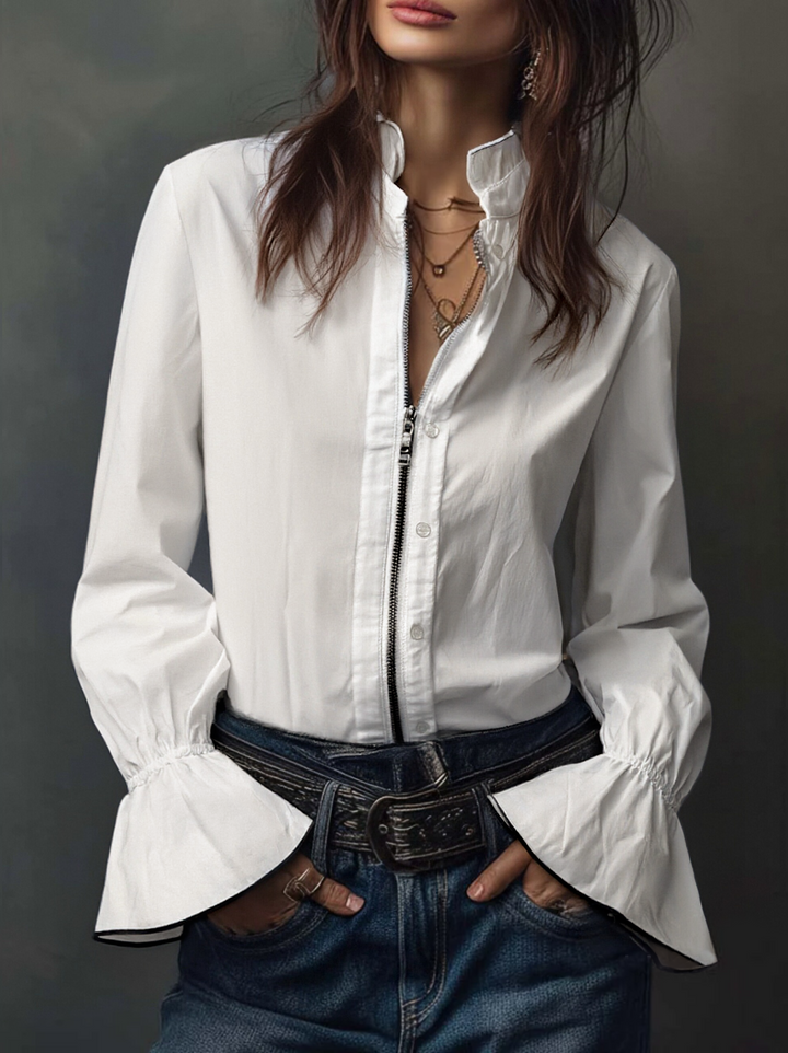 Elegant white long-sleeve blouse for women, showcasing a modern zip front and sophisticated bell cuffs.