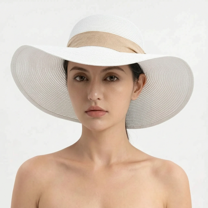 Breathable women's wide brim sun hat, foldable and comfortable for summer outdoor wear.