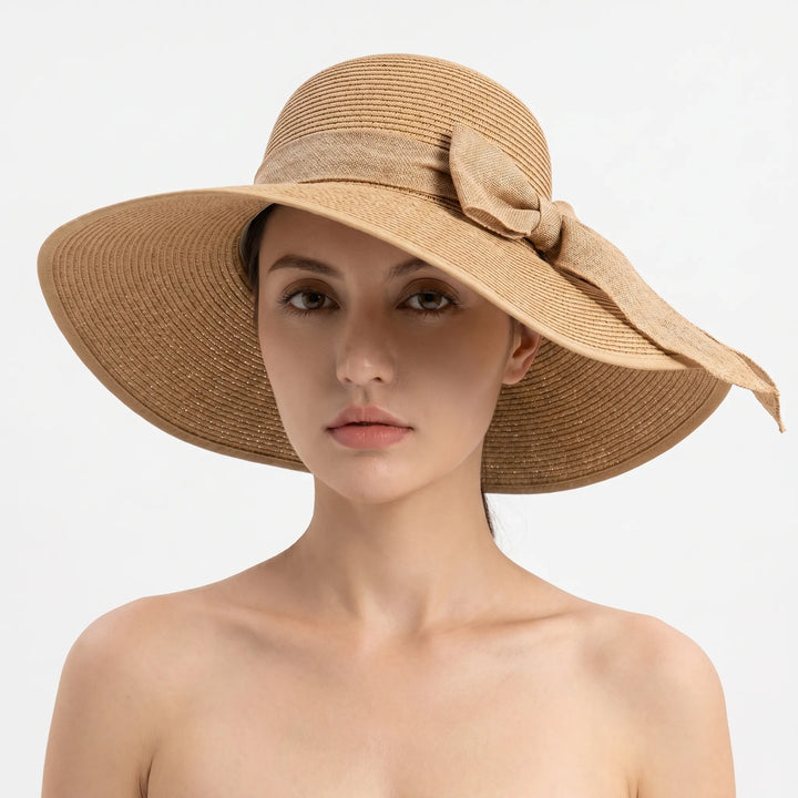Stylish women's wide brim sun hat, fashionable accessory for summer, beach & travel.