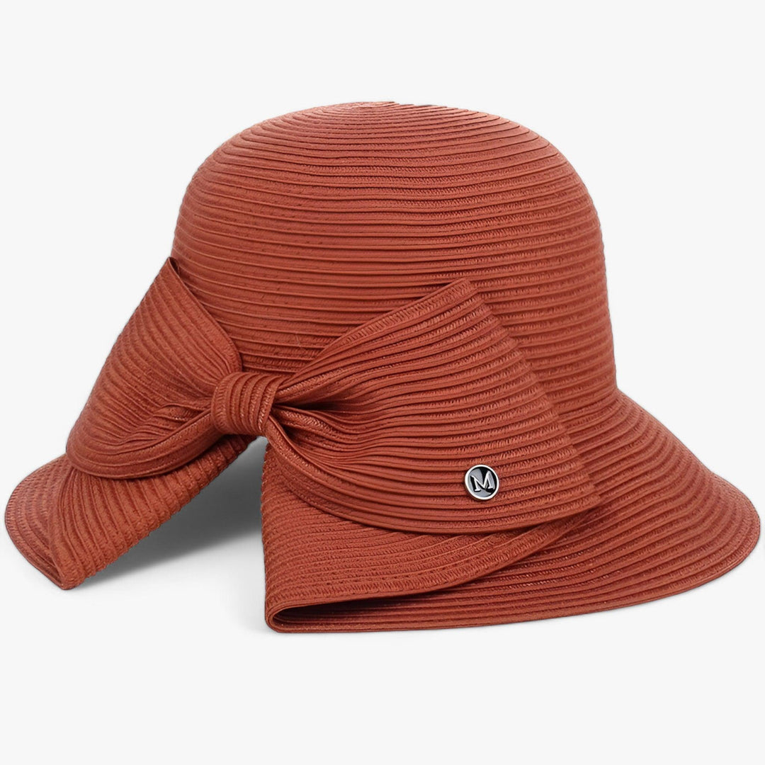 Khaki wide brim beach hat for women, providing essential UV protection for sunny days & stylish travel.