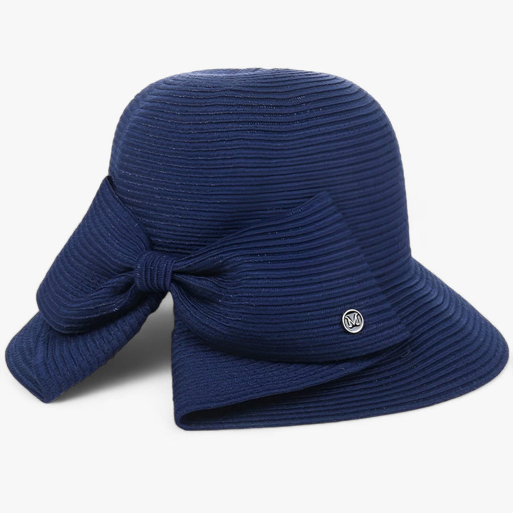 Soléra wide brim sun hat in natural Panama straw, women's stylish UV protection for beach & garden.