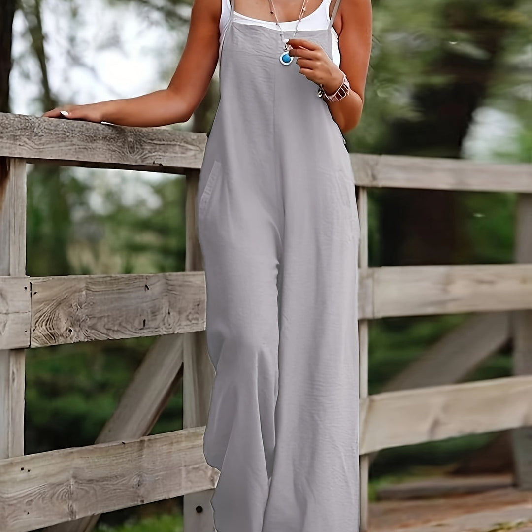 Women's casual wide leg dungaree jumpsuit, featuring a relaxed silhouette and pockets.
