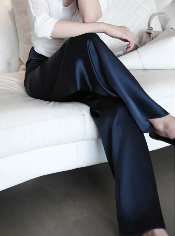 Modern women's wide leg high waist loose fit pants, chic and comfortable for any occasion.