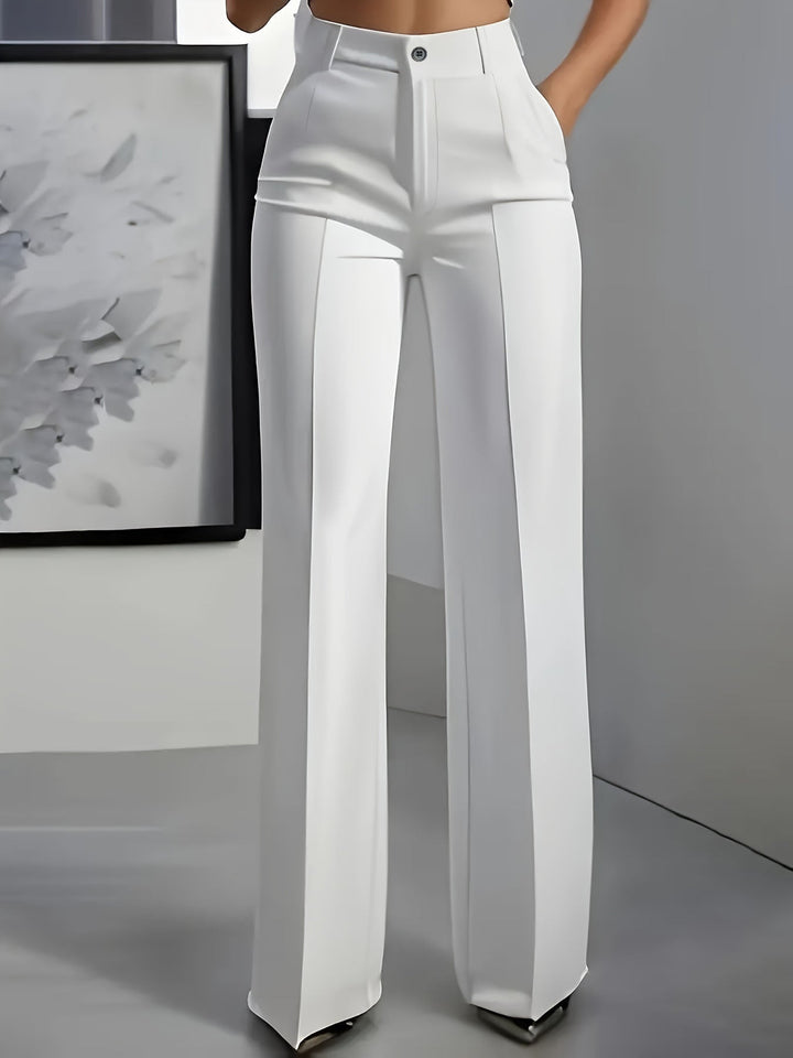 Comfortable women's wide-leg trousers, high-waisted and structured, ideal for office and relaxed casual outfits.