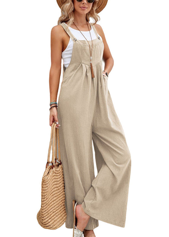Chic women's wide leg jumpsuit. Relaxed fit, adjustable spaghetti straps, and deep pockets. Great for warm weather style.