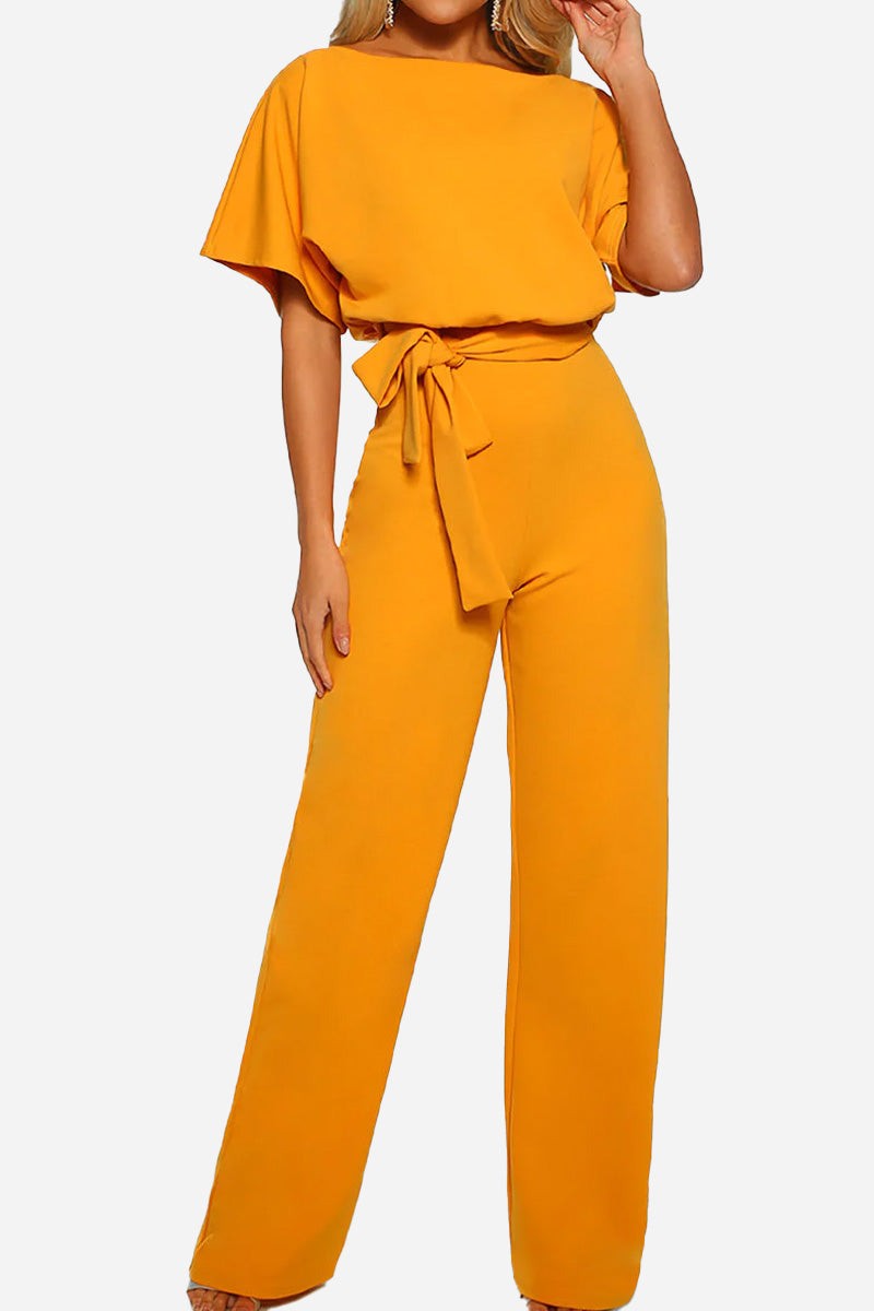 Comfortable women's wide-leg jumpsuit with batwing sleeves & belt. A versatile one-piece for casual chic.