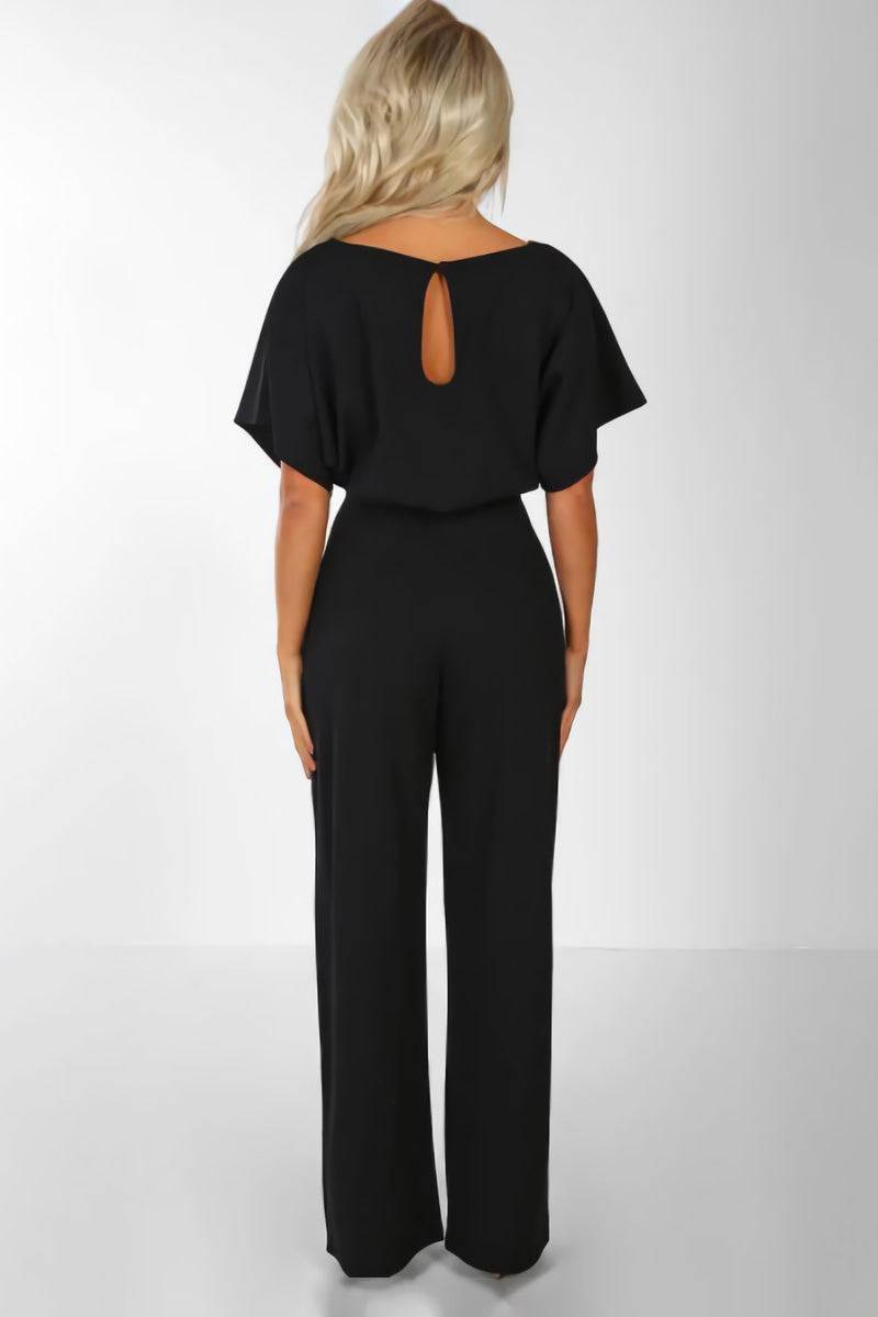 Women's wide-leg jumpsuit, designed with batwing sleeves & a cinched belt. Great for parties or casual wear.