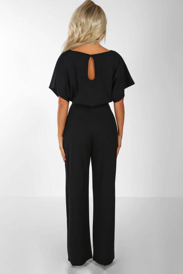 Women's wide-leg jumpsuit, designed with batwing sleeves & a cinched belt. Great for parties or casual wear.