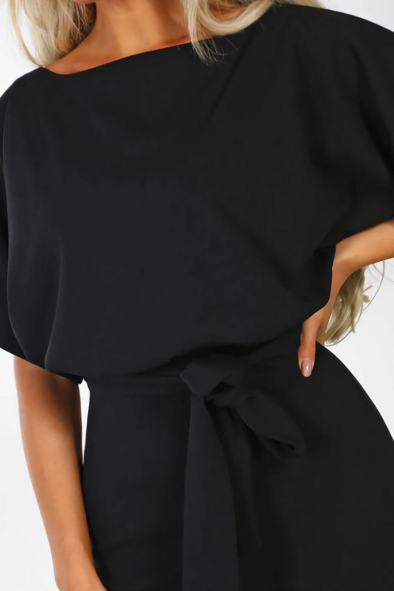 Summer style women's wide-leg jumpsuit with elegant batwing sleeves & a fashionable belt. Comfortable fit.