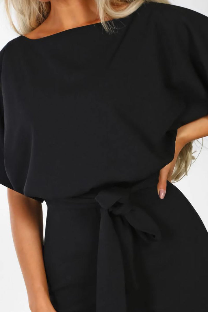 Summer style women's wide-leg jumpsuit with elegant batwing sleeves & a fashionable belt. Comfortable fit.