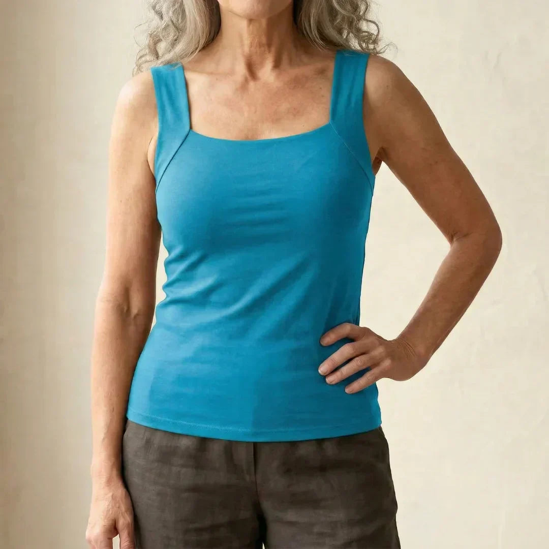 Comfortable activewear women's built-in bra tank top, wire-free support for movement and ease.