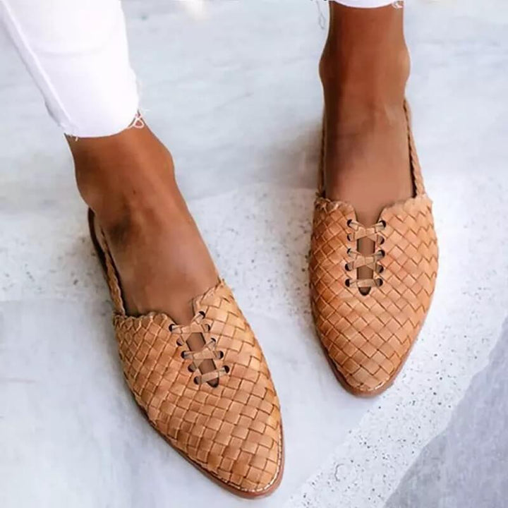Women's woven pointed toe flat loafers. Slip-on design for all-day comfort. Elegant and versatile summer footwear.