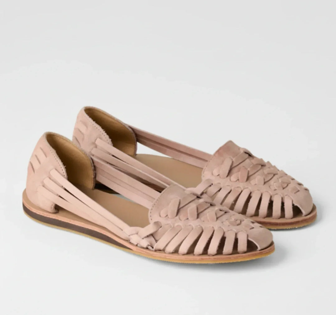 Orthopedic slip-on mules for women with arch support. Woven design for comfortable, casual summer style.