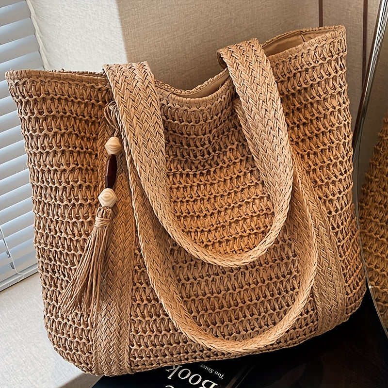 Women's woven straw tote bag with playful fringe & chic tassel. Perfect summer beach shoulder bag.