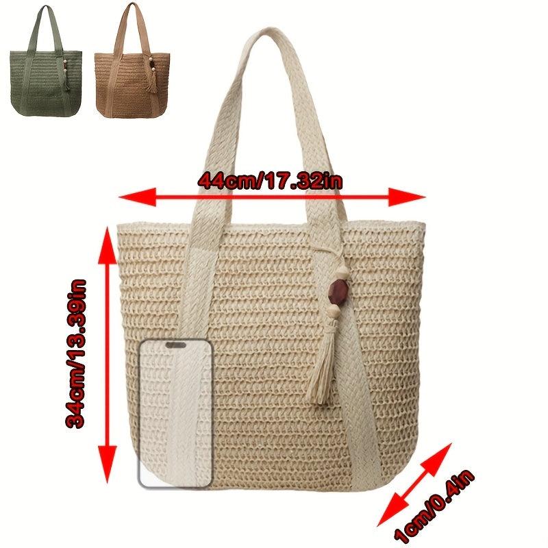 Trendy women's shoulder tote made from woven straw, accented with beautiful fringe and a unique tassel.