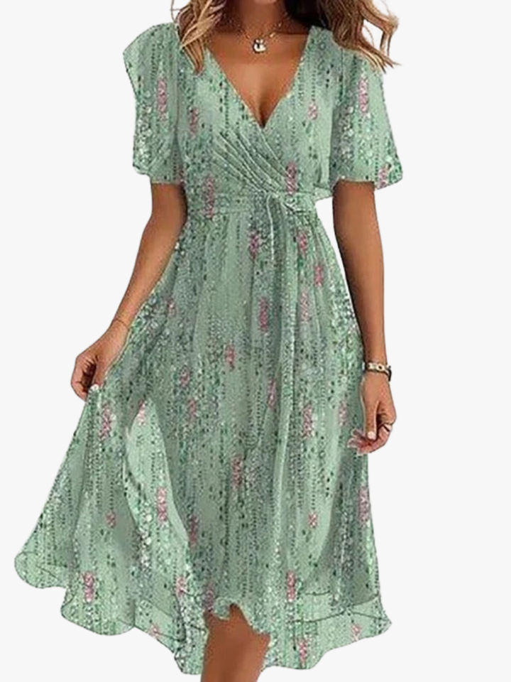 Women's wrap V-neck midi dress with flutter sleeves and ruffle hem, ideal for summer elegance.