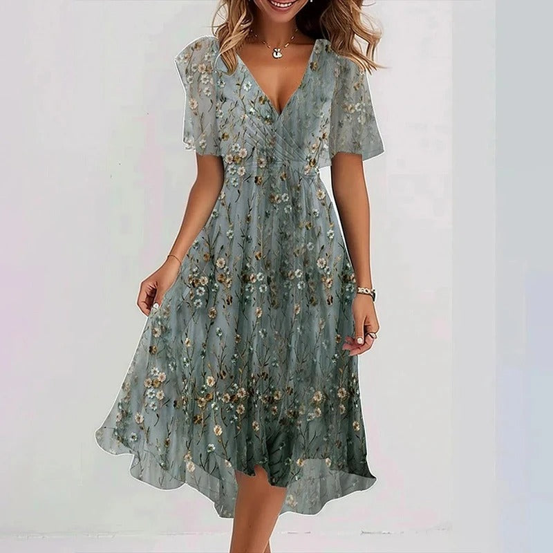 Casual yet elegant women's wrap V-neck midi dress with flutter sleeves & a comfortable fit.