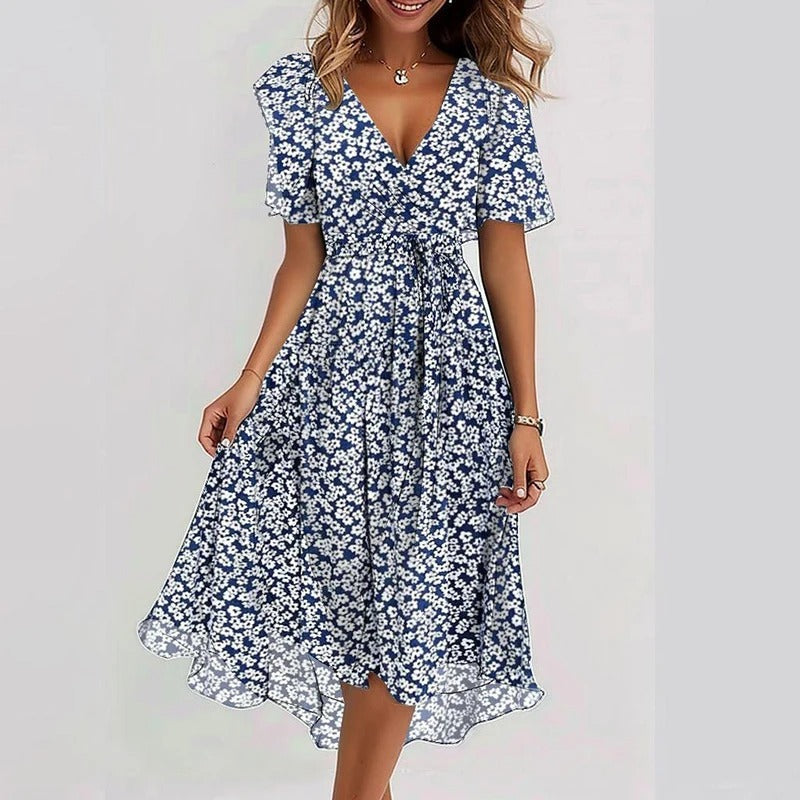 Feminine women's wrap midi dress with V-neck, graceful flutter sleeves, and stylish ruffle hem.