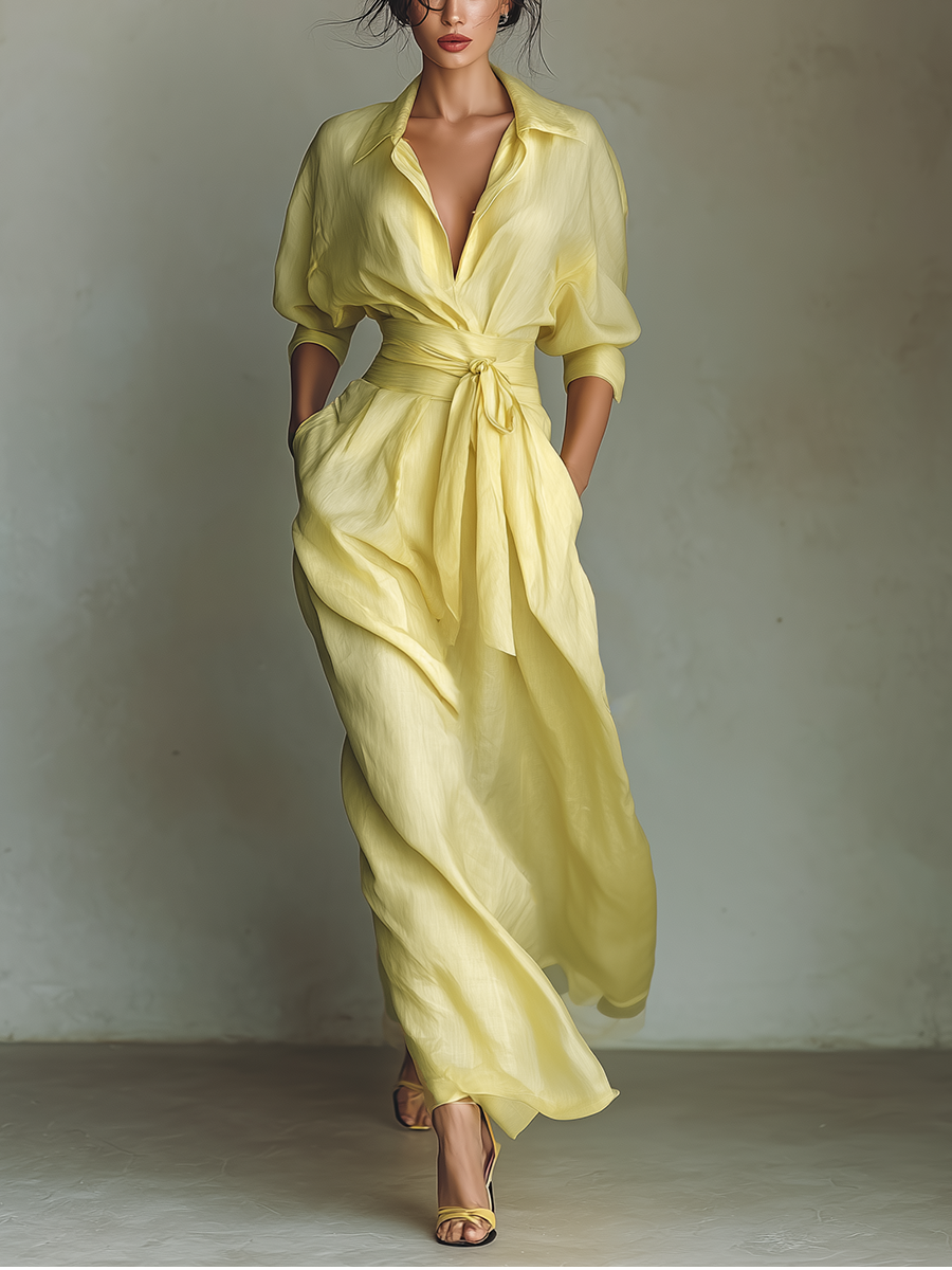 Women's yellow elegant shirt maxi dress. Long sleeve, V-neck, flowy design for casual summer fashion or resort wear.