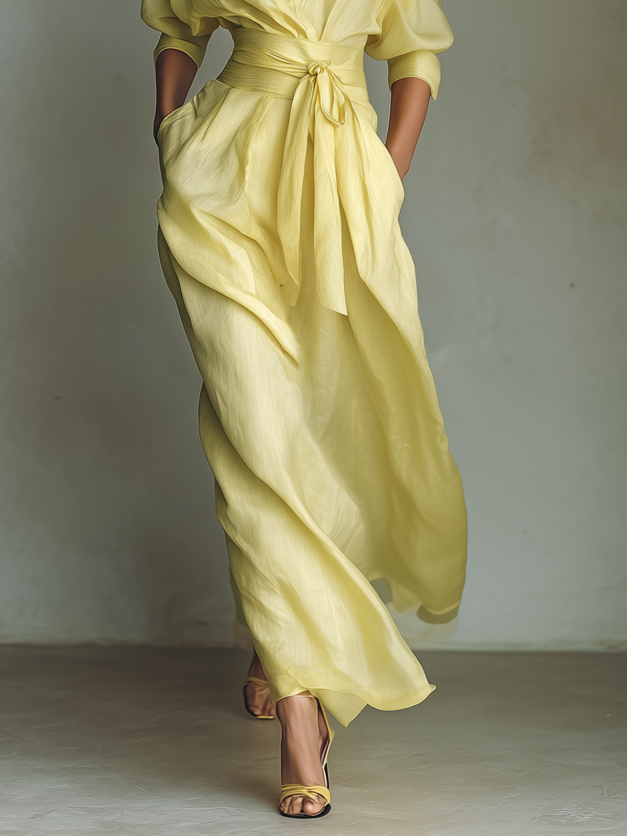 Elegant yellow long sleeve V-neck maxi shirt dress for women. Stylish and comfortable casual wear for any occasion.