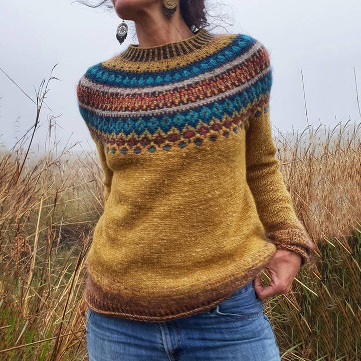 Women's yellow Fair Isle knit sweater with crew neck, long sleeves, and relaxed fit, perfect for cozy winter fashion.