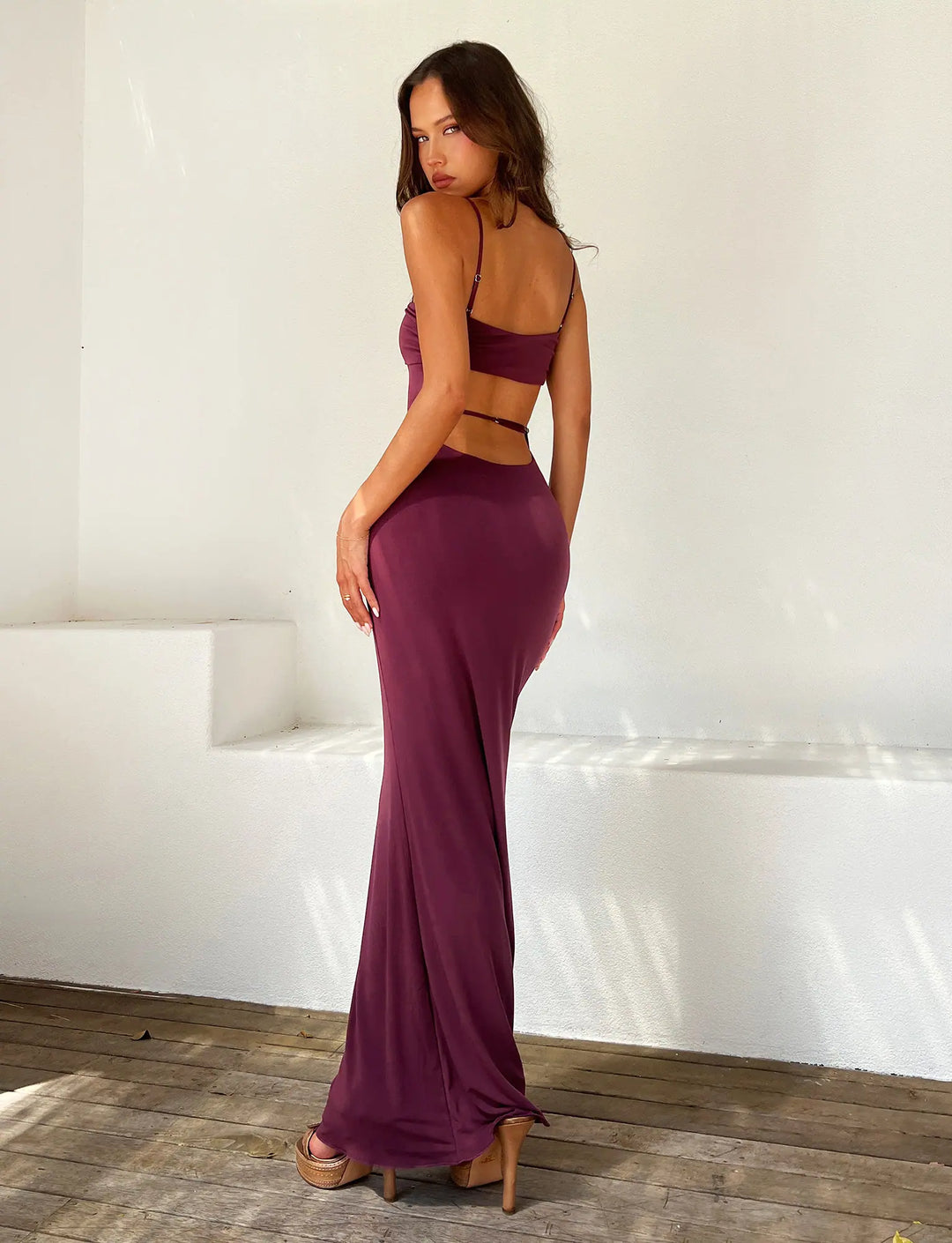 Long backless evening gown, elegant & formal for women's special events.