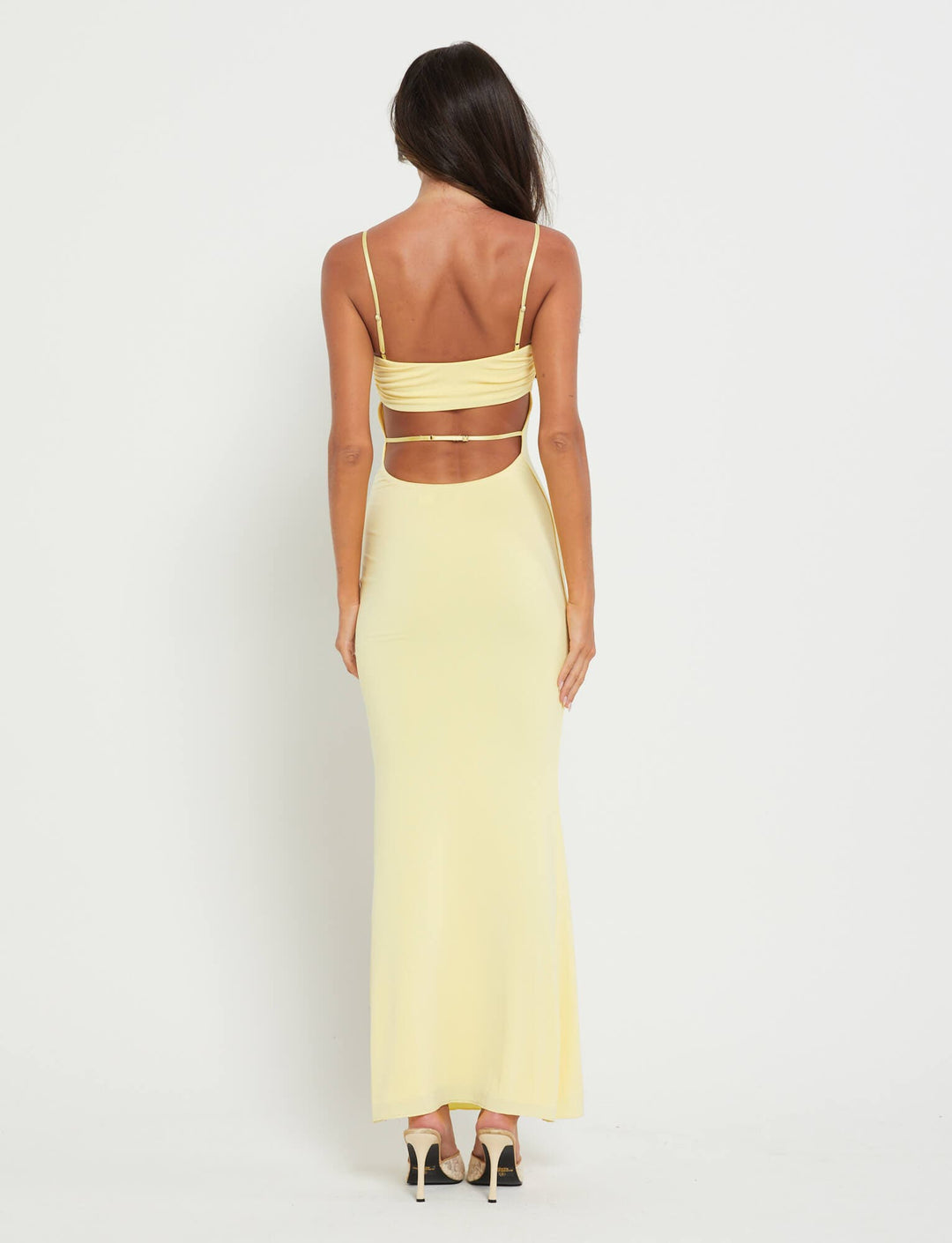 Stunning women's backless evening dress, a chic formal gown for special nights.