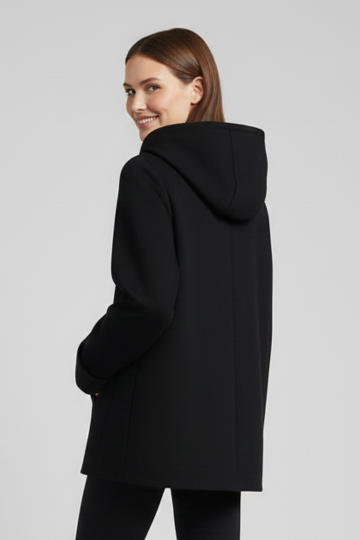 Soft women's hooded zip-up jacket with pockets, a comfortable layering piece for everyday casual style.